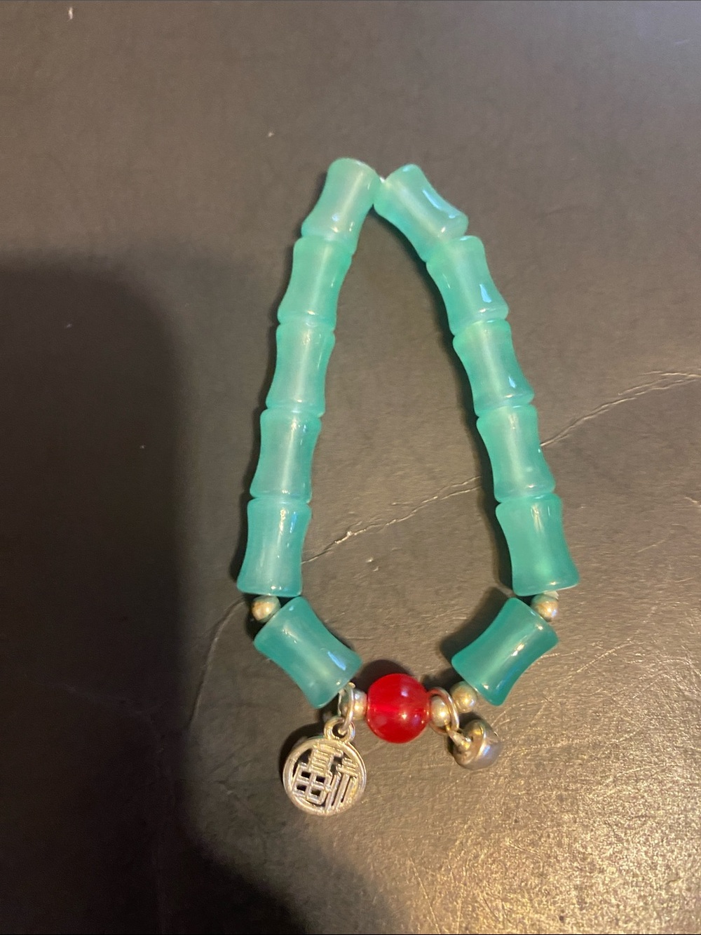 Turquoise Bamboo Bead Bracelet with Red Accent and Silver Charms